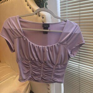 a lilac purple crop top